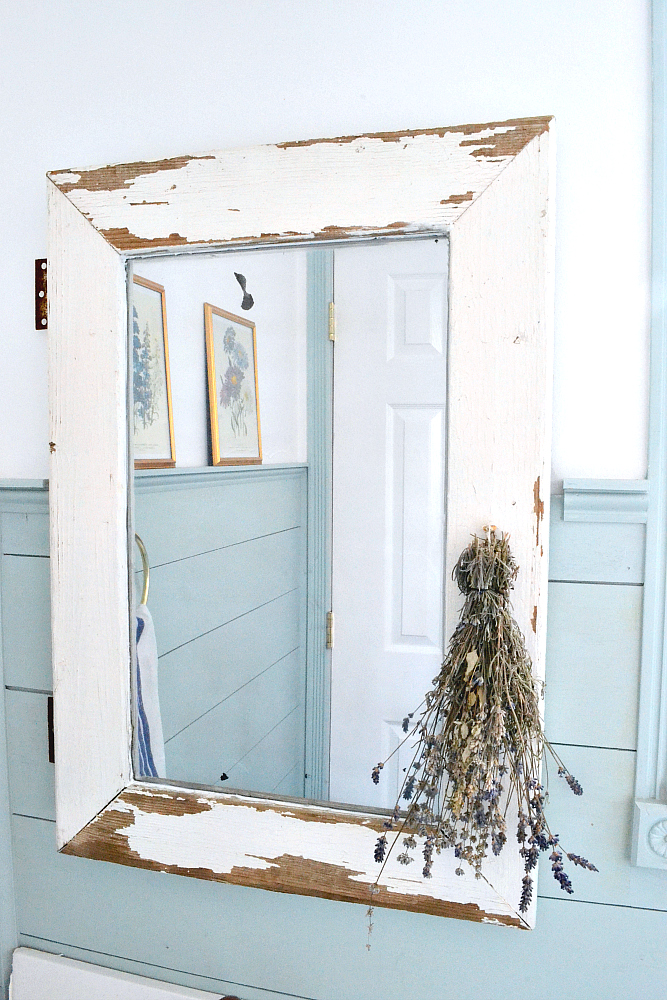 DIY Farmhouse Mirror Tutorial. Turn a salvaged window into a farmhouse mirror in just a few easy steps! Find it on theweatheredfox.com