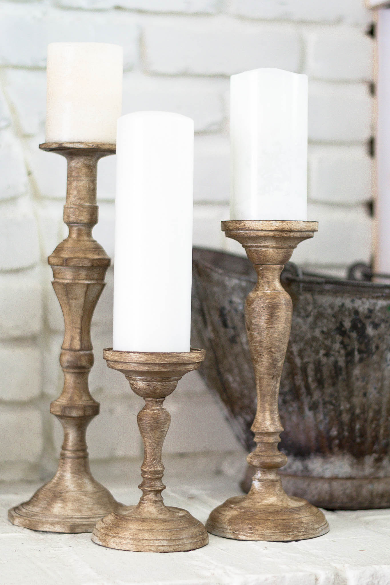Easy DIY Candle Holders tutorial! Take old candlesticks and turn them into gorgeous Fixer Upper style wood farmhouse candlesticks!