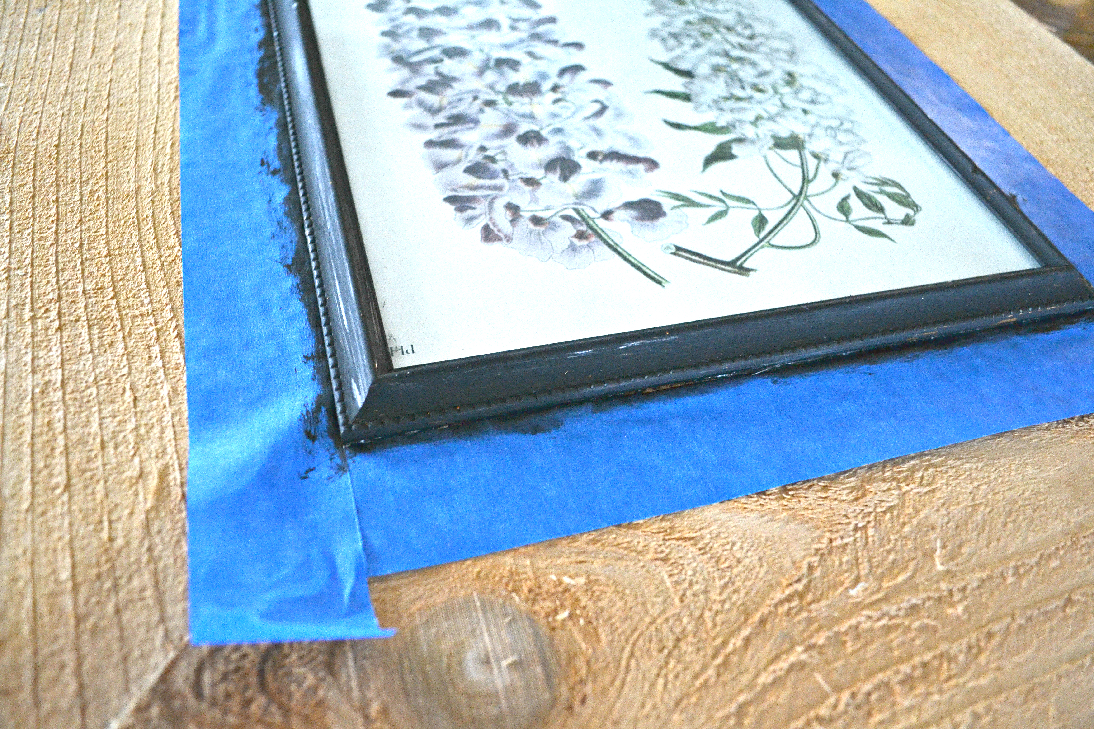 Make a giant wood frame from a dollar store picture frame