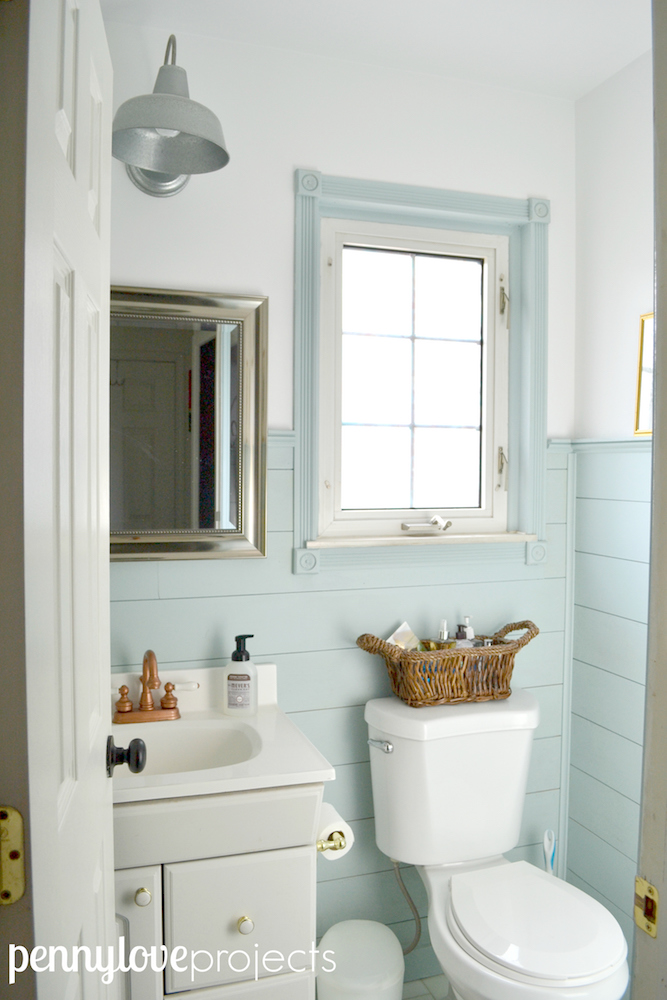 How to paint a laminate vanity to look like weathered wood in a few easy steps.