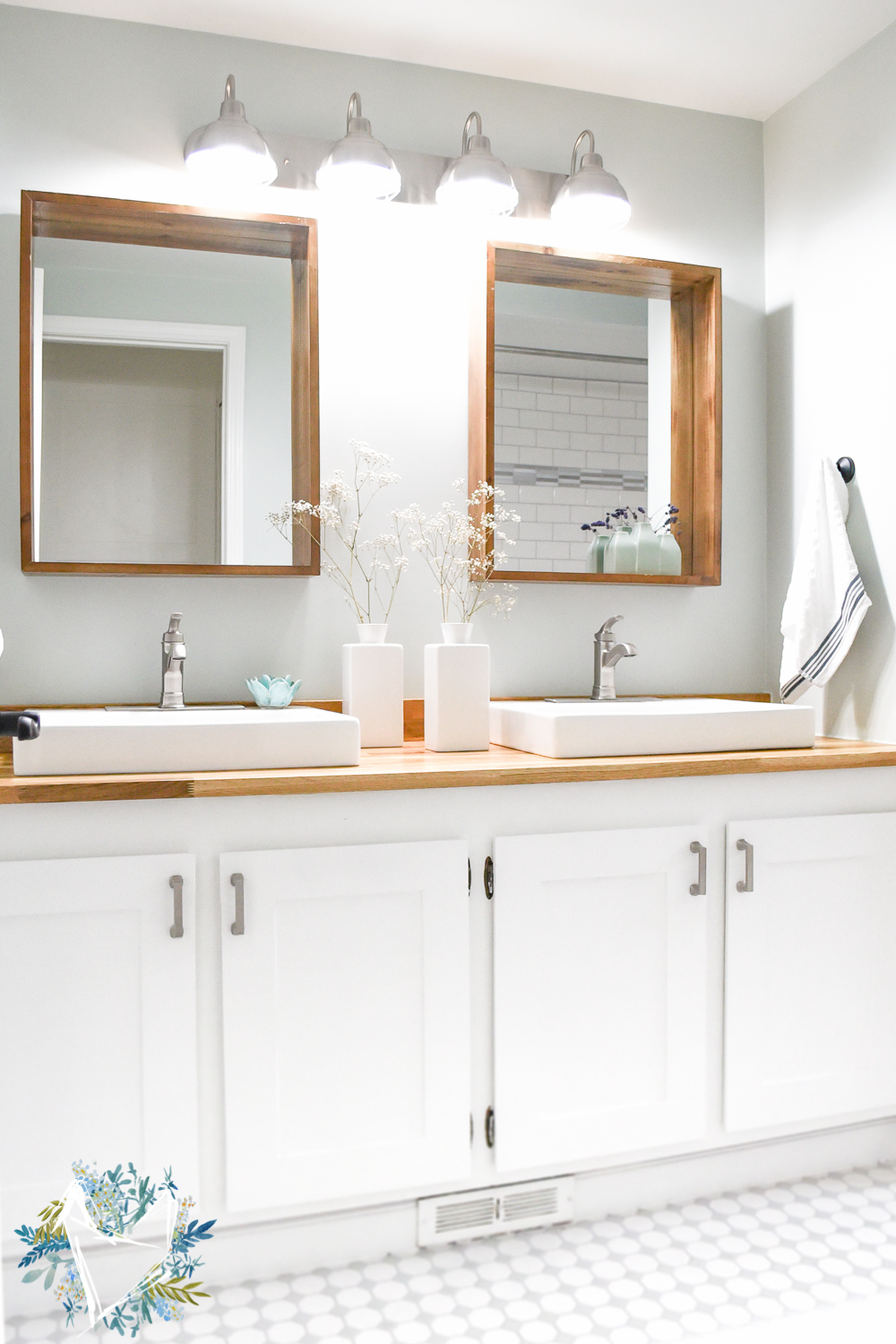 This Modern Farmhouse Bathroom is the perfect way to get a fixer upper farmhouse look on a budget! Your guests will think Joanna Gaines designed it herself. Come see this amazing transformation!