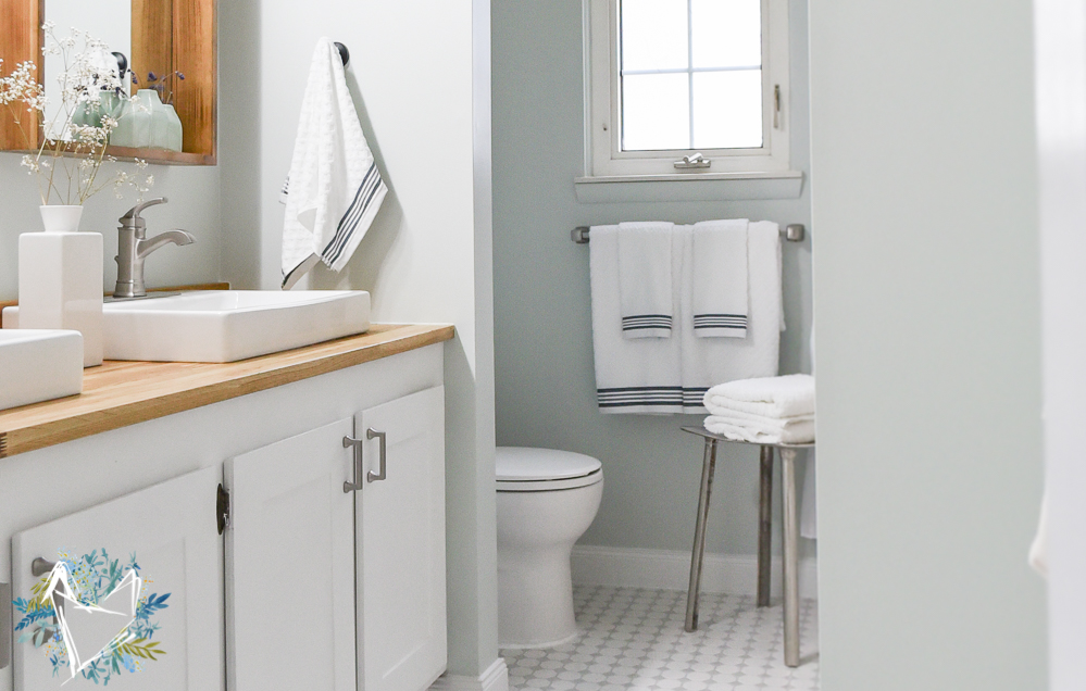 This Modern Farmhouse Bathroom is the perfect way to get a fixer upper farmhouse look on a budget! Your guests will think Joanna Gaines designed it herself. Come see this amazing transformation!