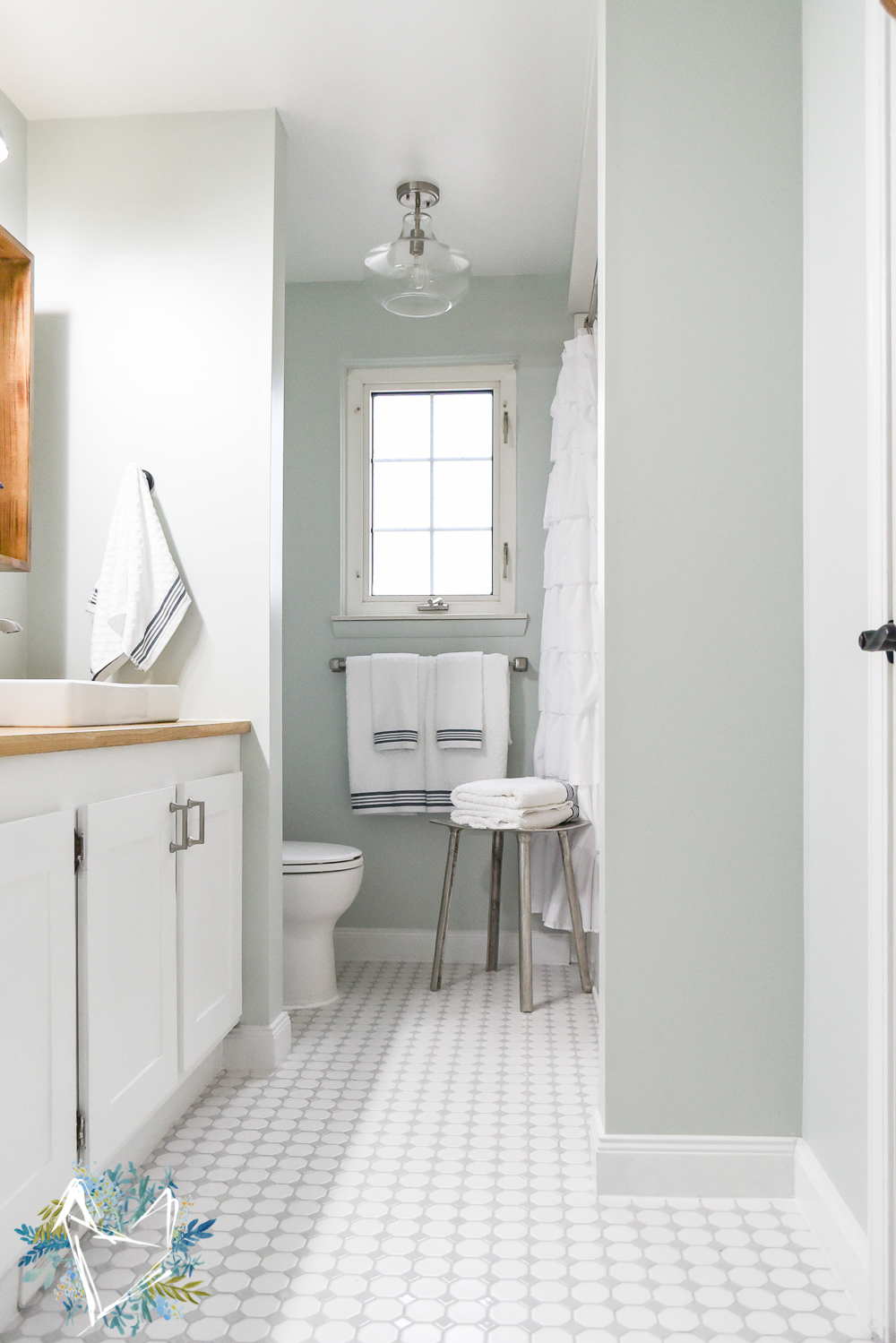 This Modern Farmhouse Bathroom is the perfect way to get a fixer upper farmhouse look on a budget! Your guests will think Joanna Gaines designed it herself. Come see this amazing transformation!