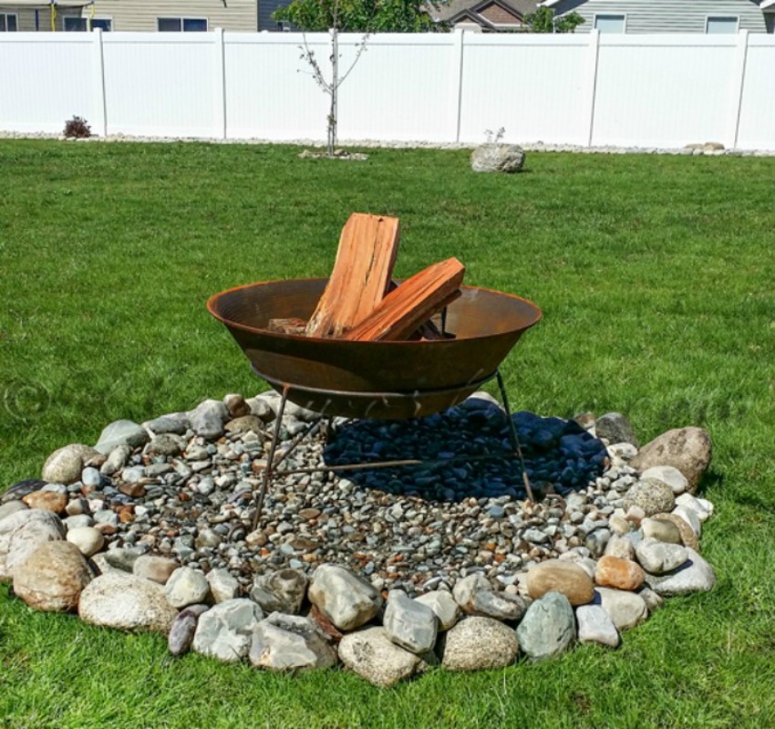 DIY Fire Pit Ideas Anyone Can Make. Get your backyard ready for summer with these easy fire pit ideas.