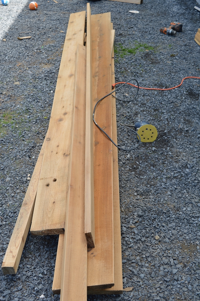 rough cut cedar lumber for a planter box
