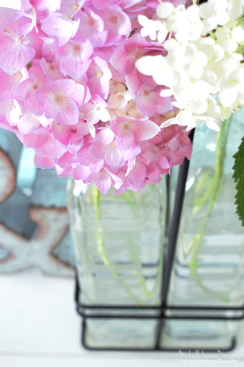 Creating a DIY farmhouse vase is easy using some upcylced bottles and etching cream. I love the clean, farmhouse style and these will blend perfectly! - www.theweatheredfox.net