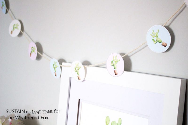 Simple watercolor cactus garland. Great baby shower decor idea!