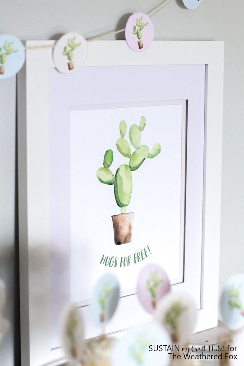 Free watercolor cactus art for the wall. Fun office, kitchen or party decor idea.