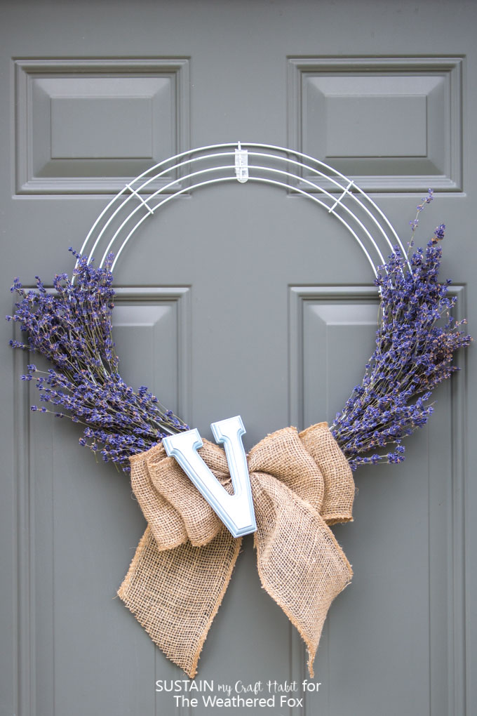 Learn how to make this simple and beautiful lavender wreath with a burlap bow and monogram letter! Full step-by-step tutorial is included.