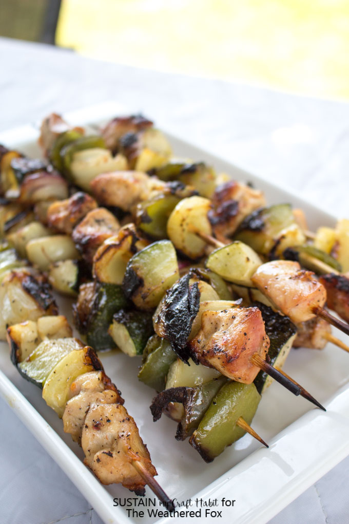 Simple grilled chicken shish kabob recipe with a creamy dill dip. Delicious low-fat, gluten free dinner or BBQ idea!