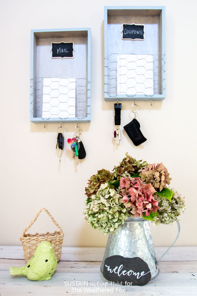 Get you entryway organized with these DIY farmhouse inspired mail sorters and key holders. Full DIY tutorial for this entryway organizer idea included.